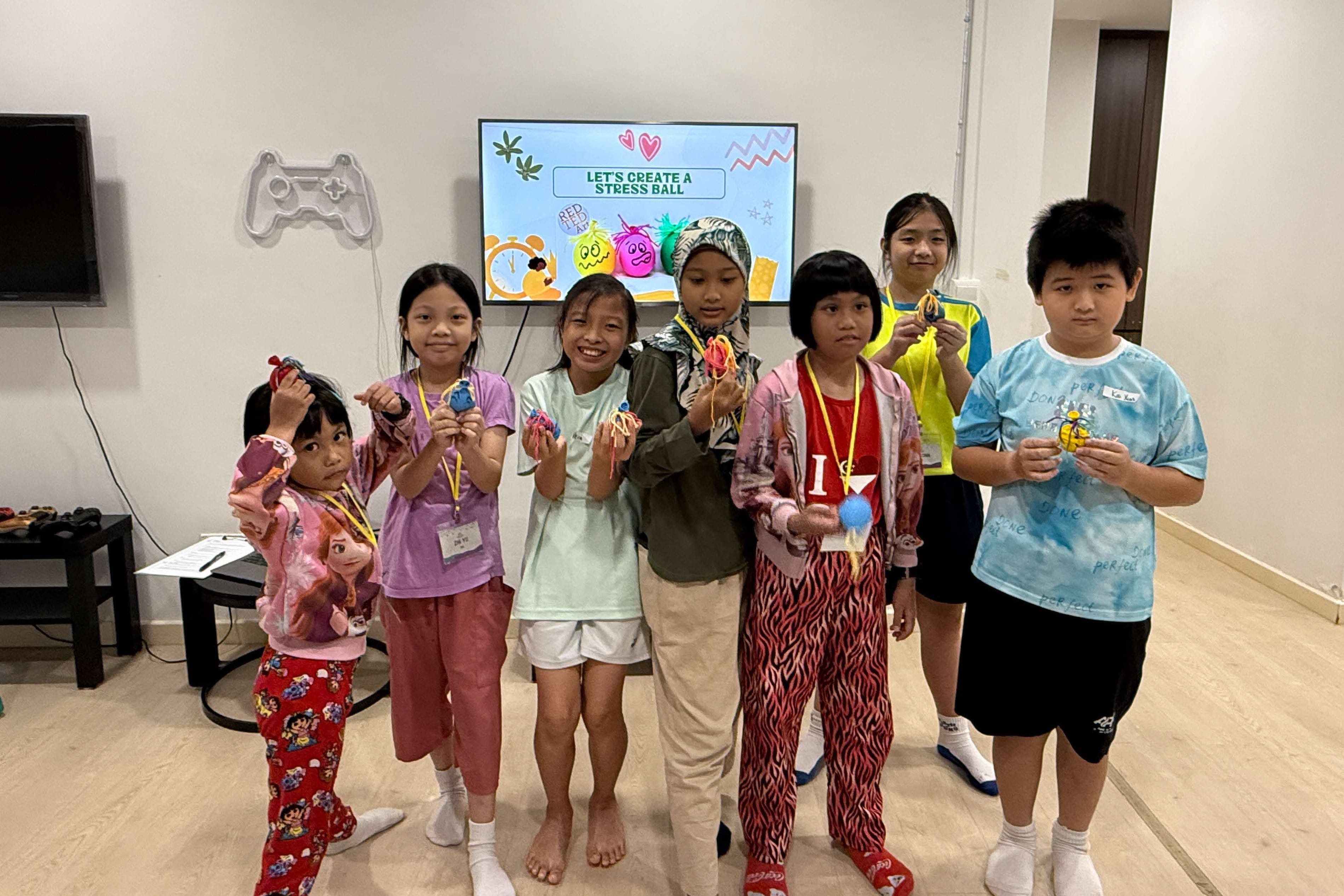 Mdm Norliza's children enjoying activities 